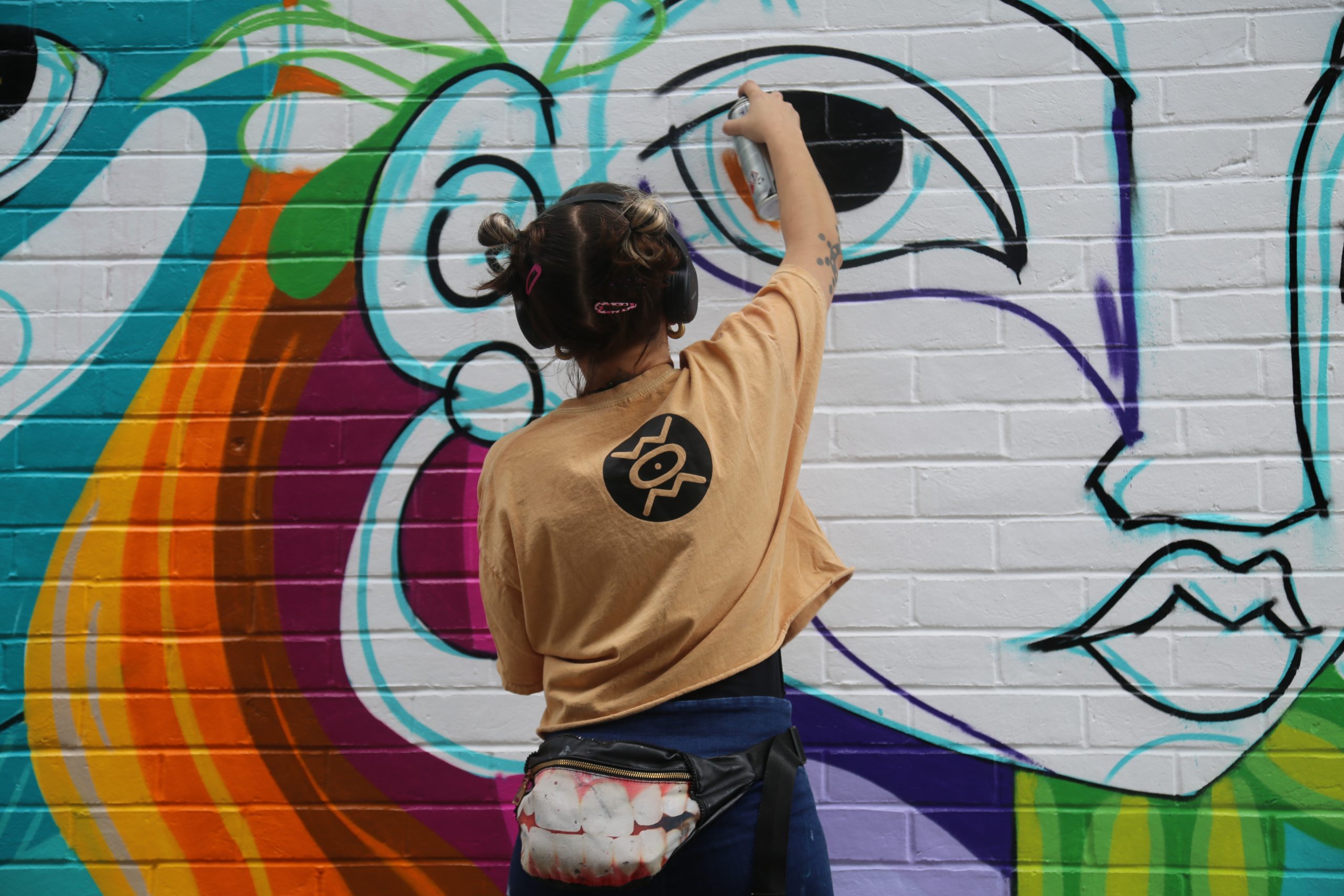Person creating street art