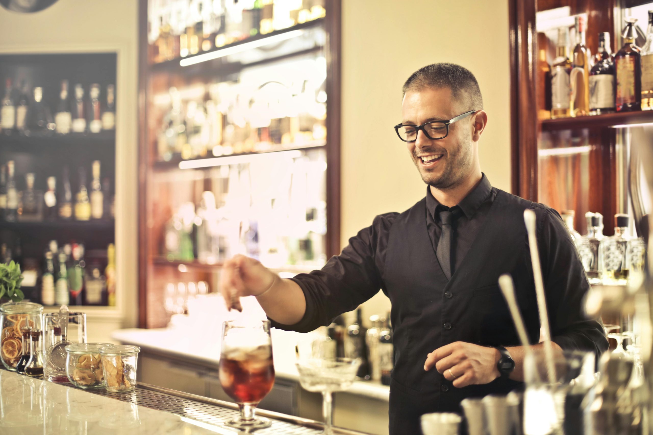 Barman serving drinks